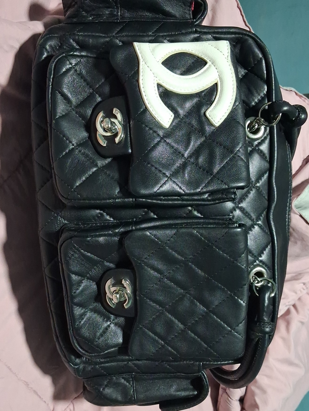CHANEL Black Quilted Leather Shoulder Bag with White Accent
